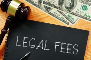 A visual representation of legal fees: Text overlaying an image of dollar bills.