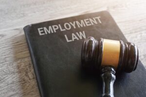 Judge's gavel and employment law book